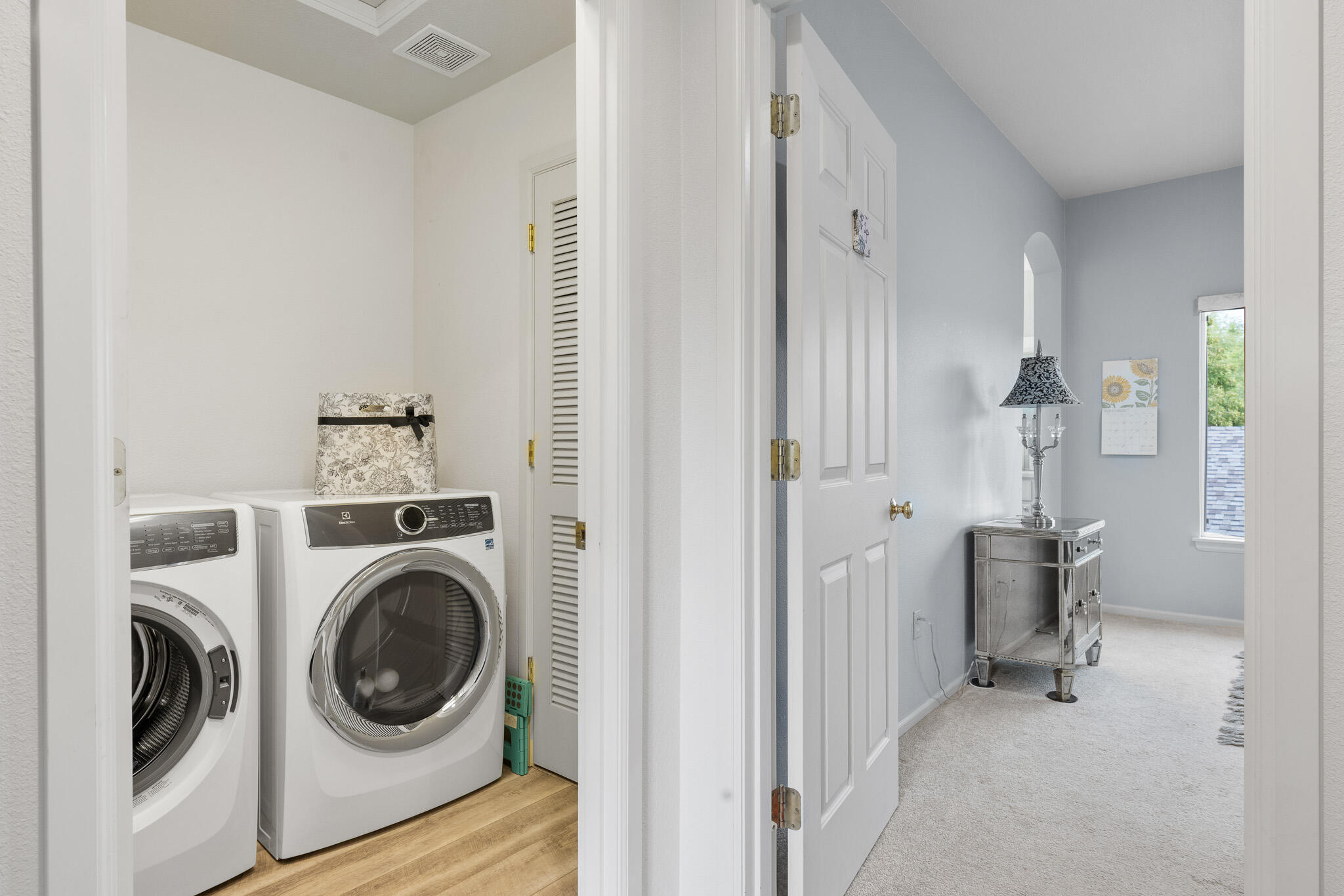 624 Southwest Hill Street Bend, OR 97702 - Photo 28 of 45 a view of a hallway with washer and dryer
