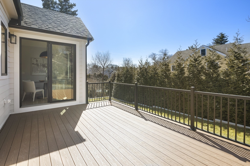 42 Thornton Road Needham, MA 02492 - Photo 6 of 38 a view of balcony with wooden floor and fence