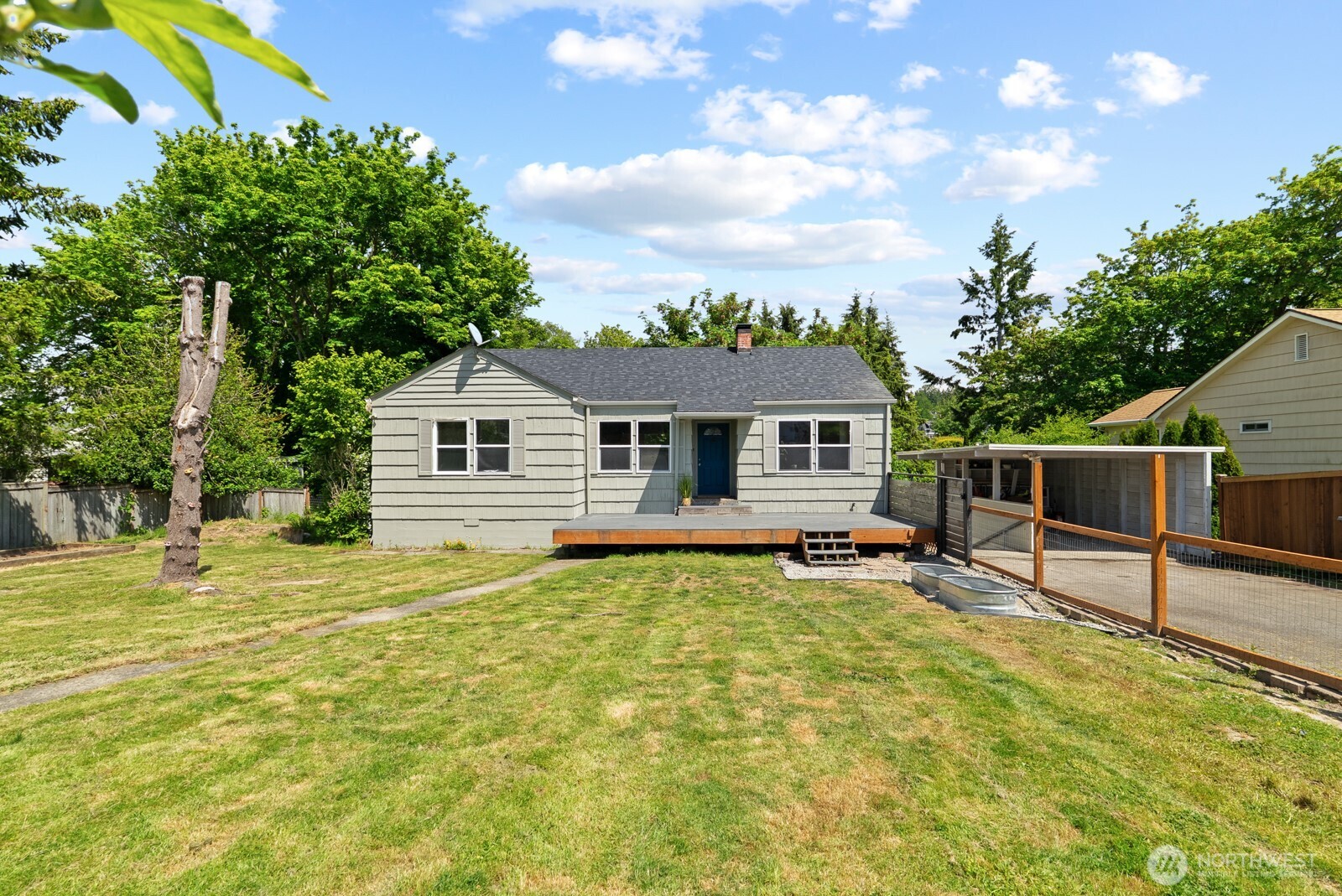307 4th Street Steilacoom, WA 98388 - Photo 1 of 39 a view of a house with backyard and sitting area