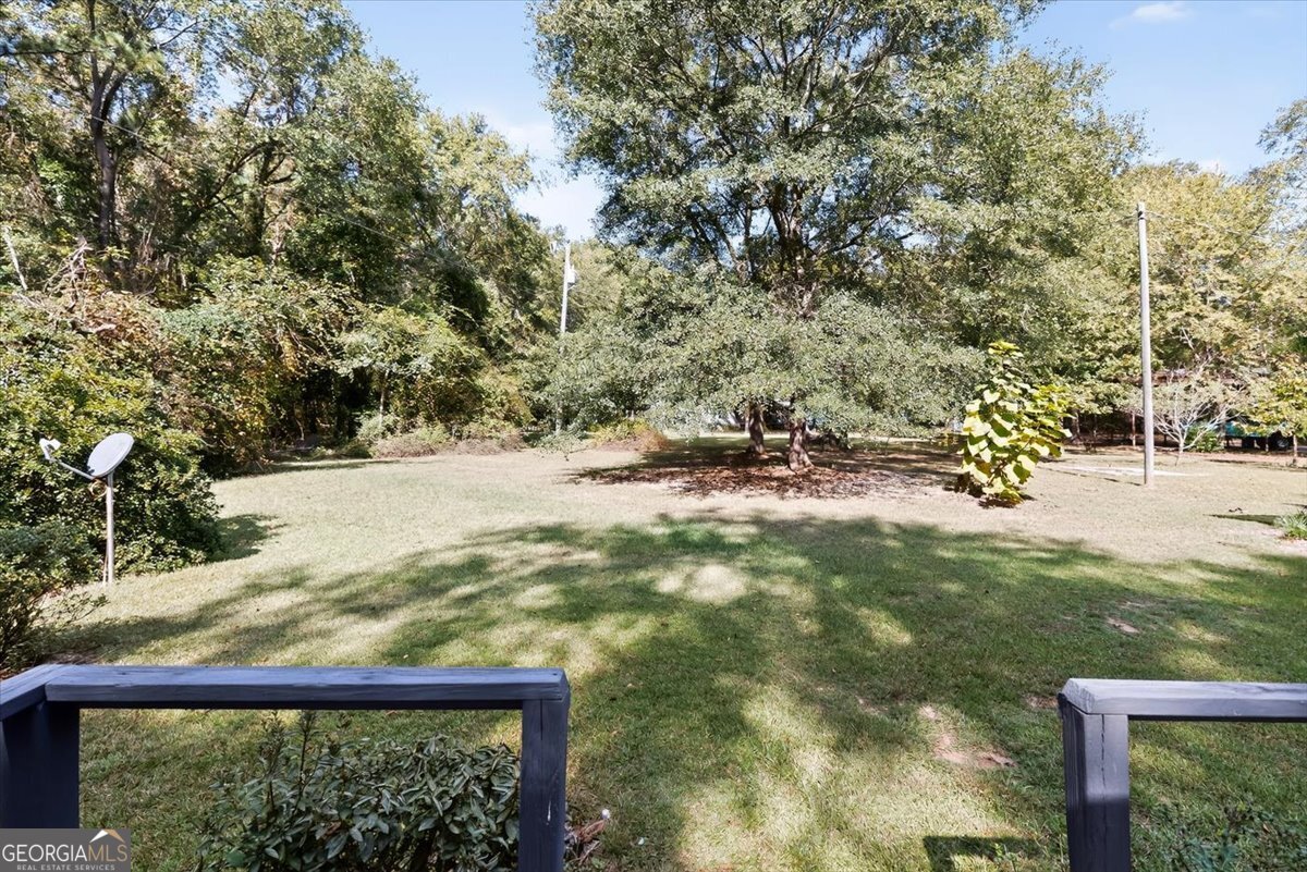 1659 Henderson Road Macon, GA 31217 - Photo 26 of 44 a view of swimming pool with a yard