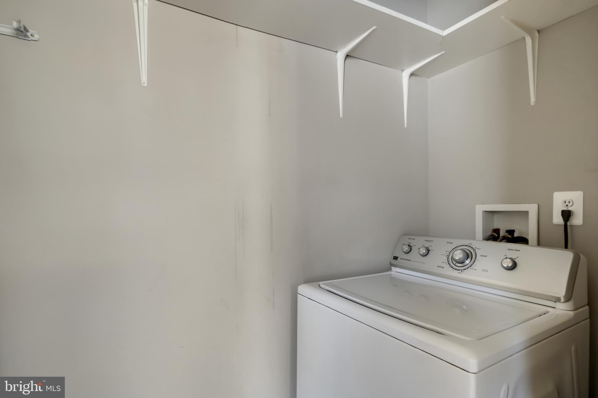 3504 Edgewood Road Baltimore, MD 21215 - Photo 23 of 60 a utility room with dryer and washer