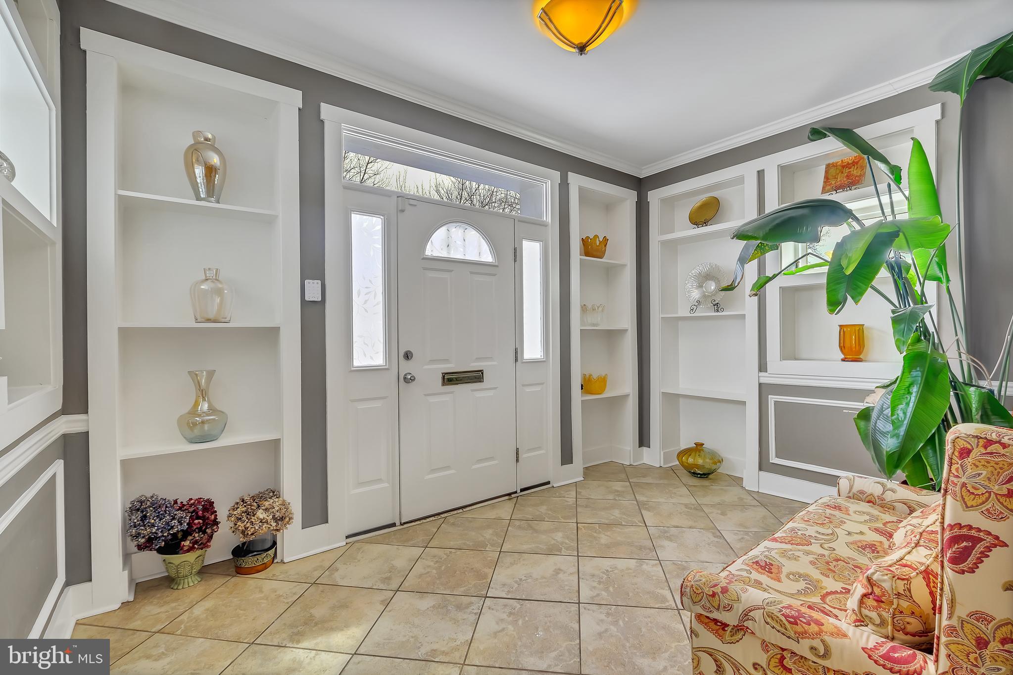 3504 Edgewood Road Baltimore, MD 21215 - Photo 3 of 60 a bedroom with a bed and a window