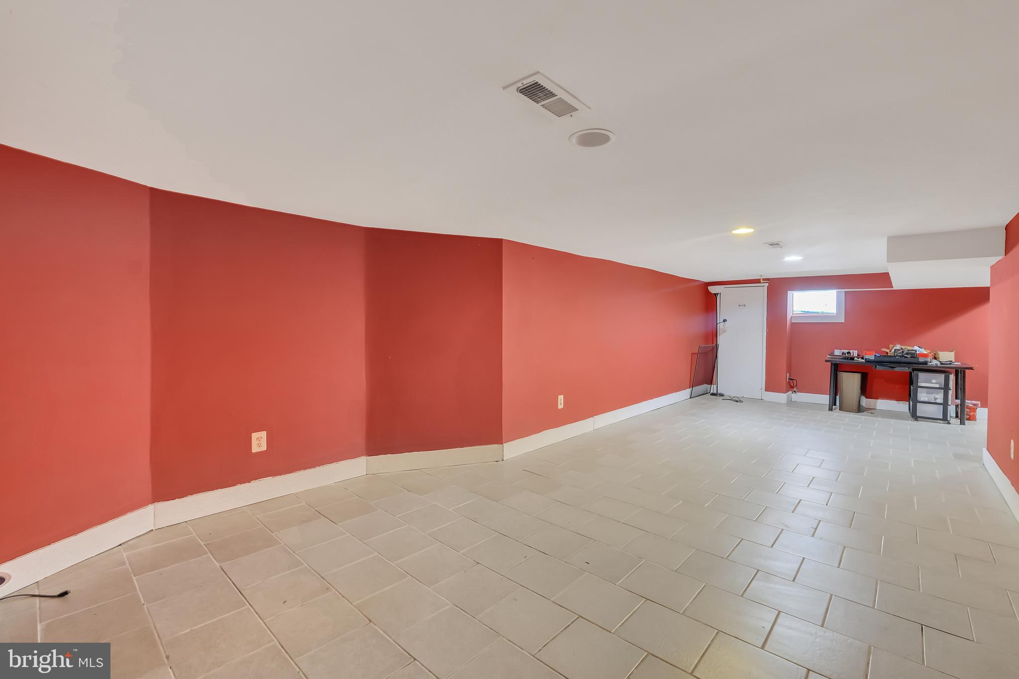 3504 Edgewood Road Baltimore, MD 21215 - Photo 45 of 60 a view of an empty room with a cabinet