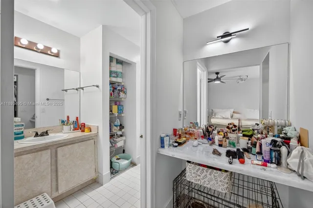 a view of a kitchen center island and living room