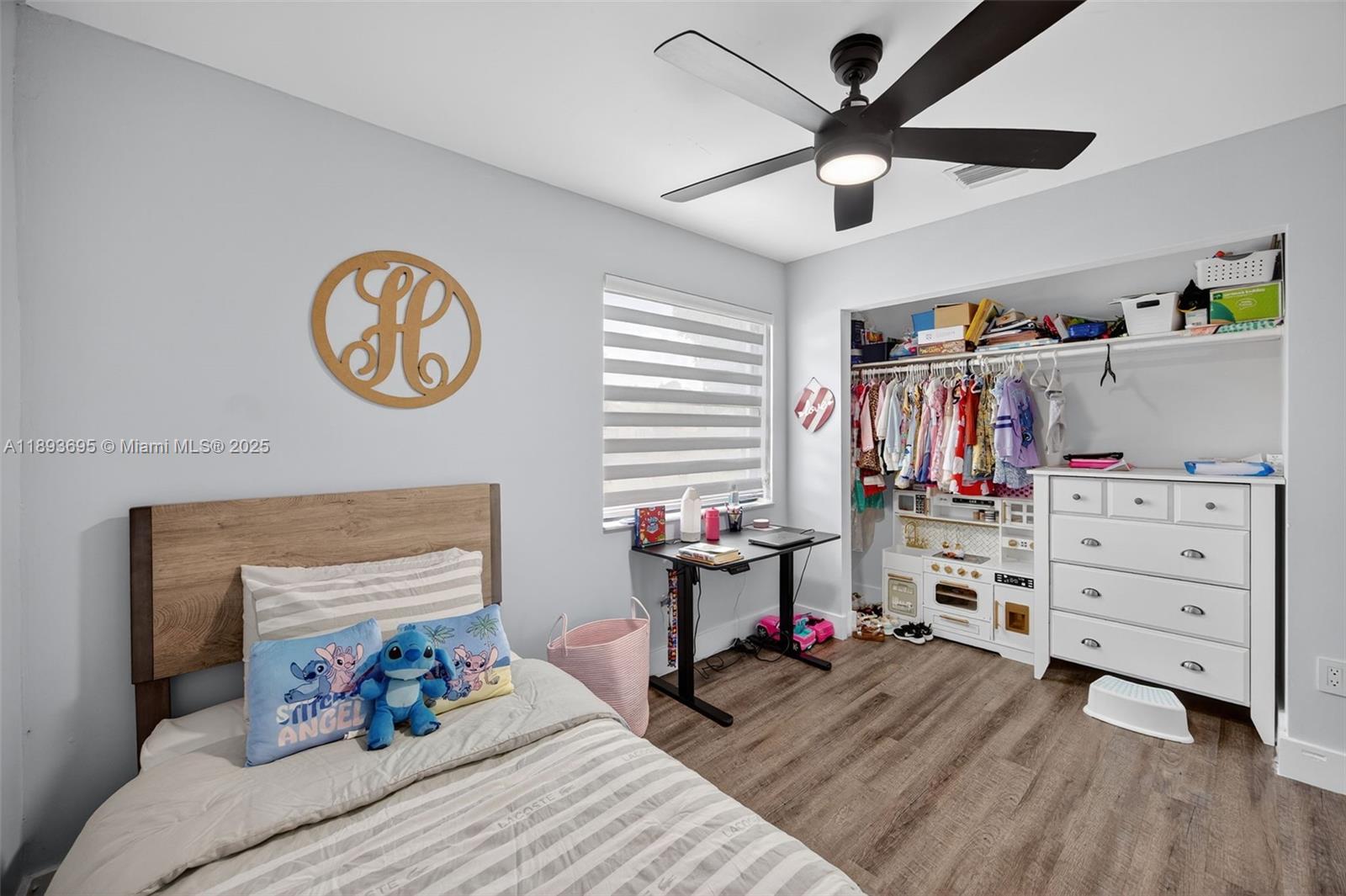 25796 Southwest 123rd Avenue Homestead, FL 33032 - Photo 26 of 26 a bed room with a bed and a chair