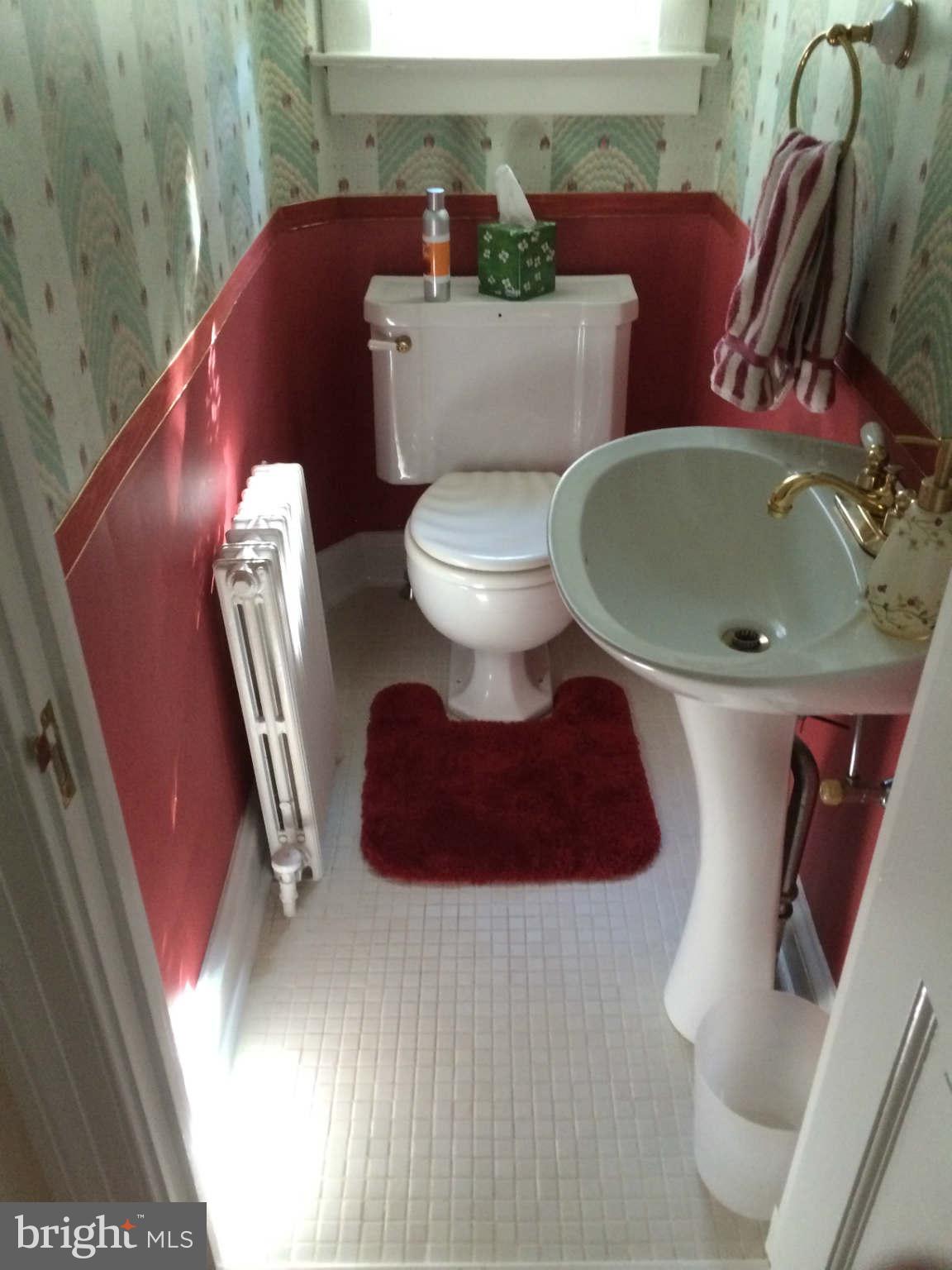 4001 Roundtop Road Baltimore, MD 21218 - Photo 15 of 30 First floor half bath