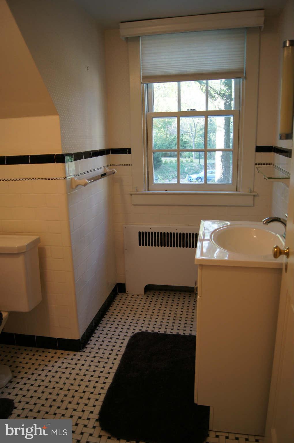 4001 Roundtop Road Baltimore, MD 21218 - Photo 19 of 30 Hall bath with shower. Next to MBR.
