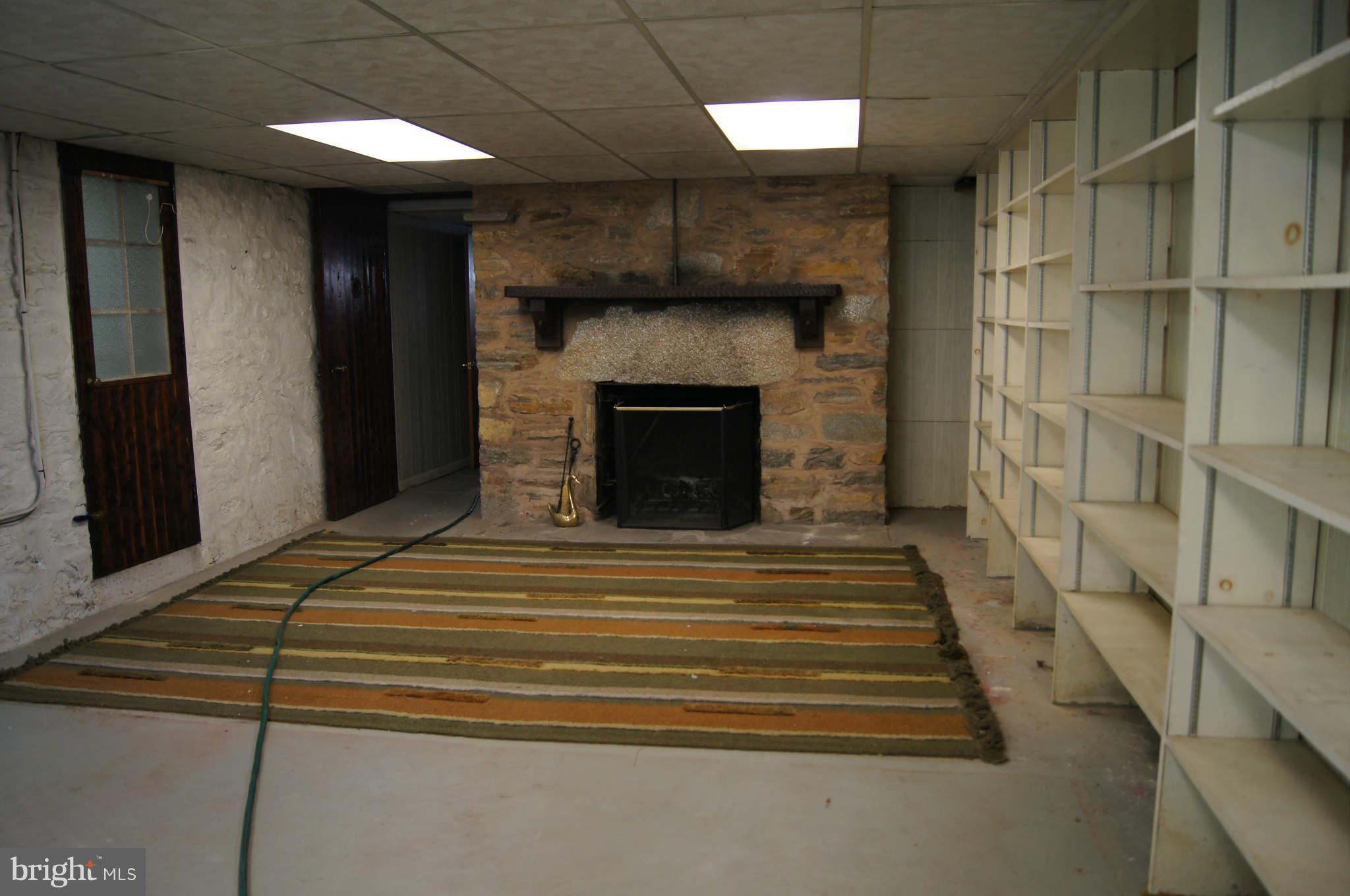 4001 Roundtop Road Baltimore, MD 21218 - Photo 27 of 30 Finished lower level clubrm with fp