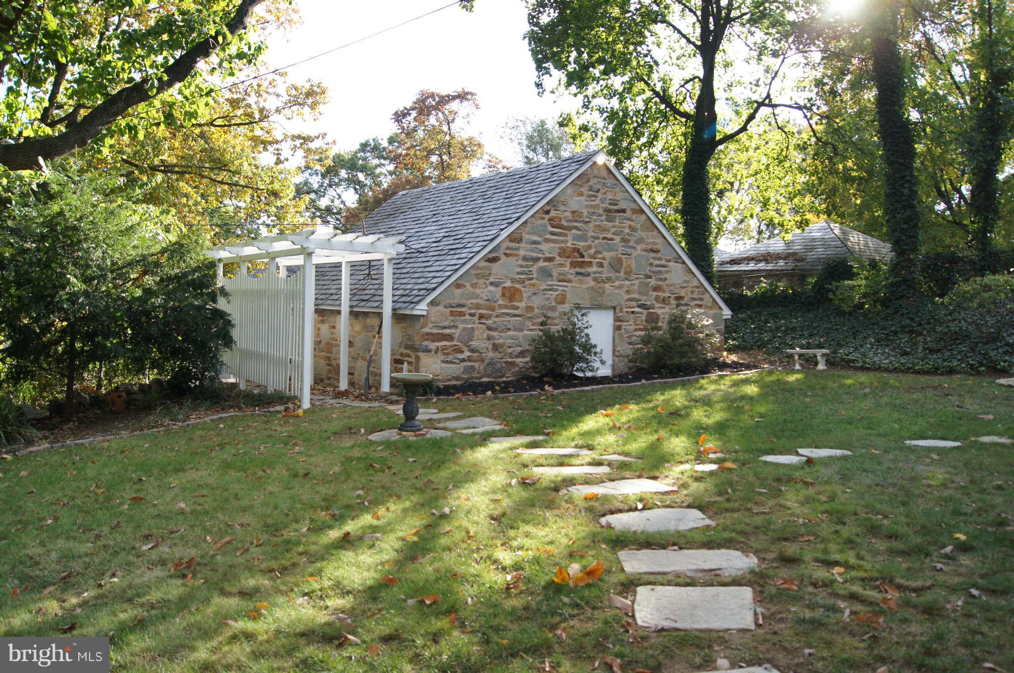4001 Roundtop Road Baltimore, MD 21218 - Photo 29 of 30 Arbor leading to 2-car detached garage
