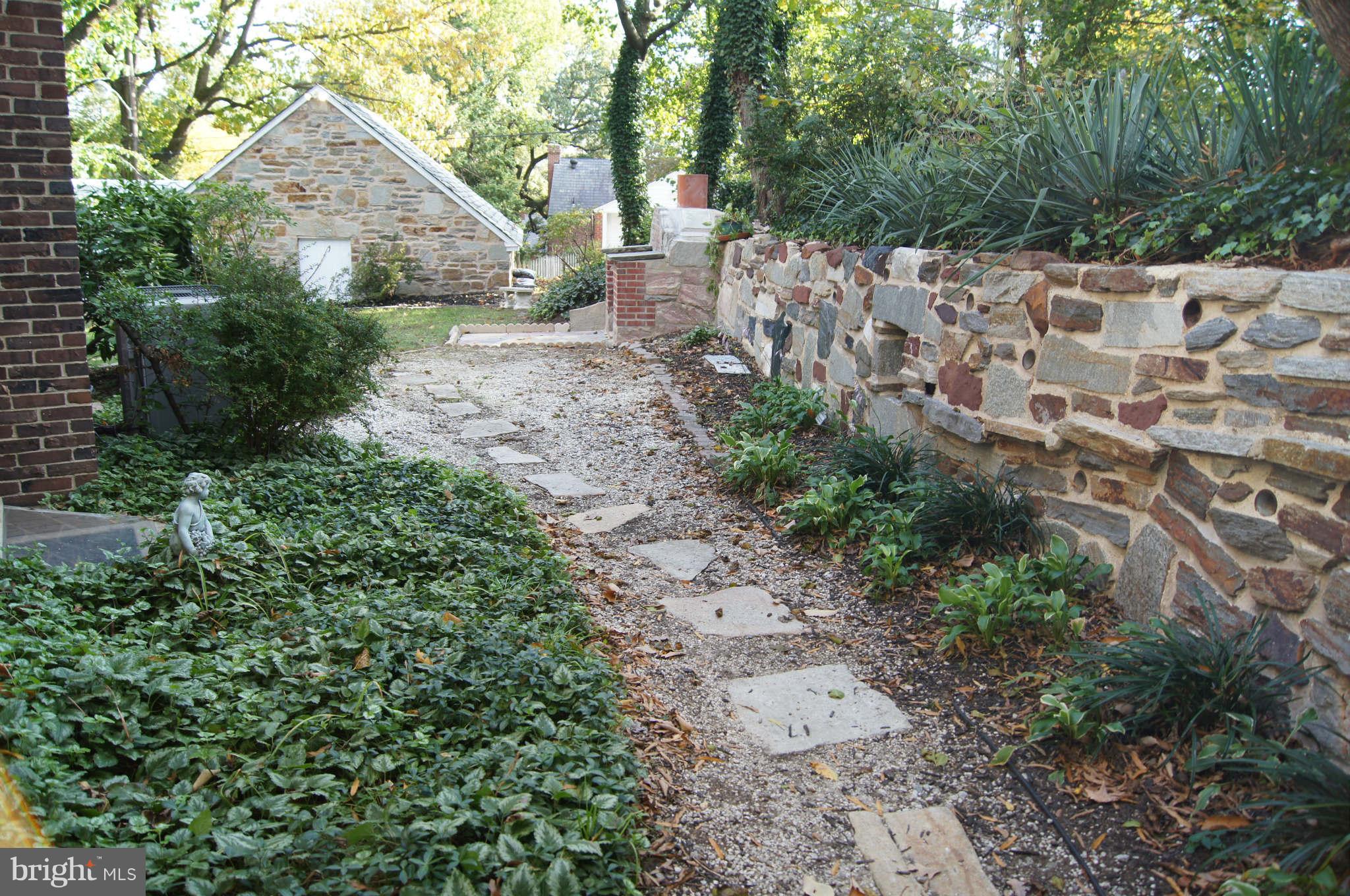 4001 Roundtop Road Baltimore, MD 21218 - Photo 30 of 30 Stone wall with fountain