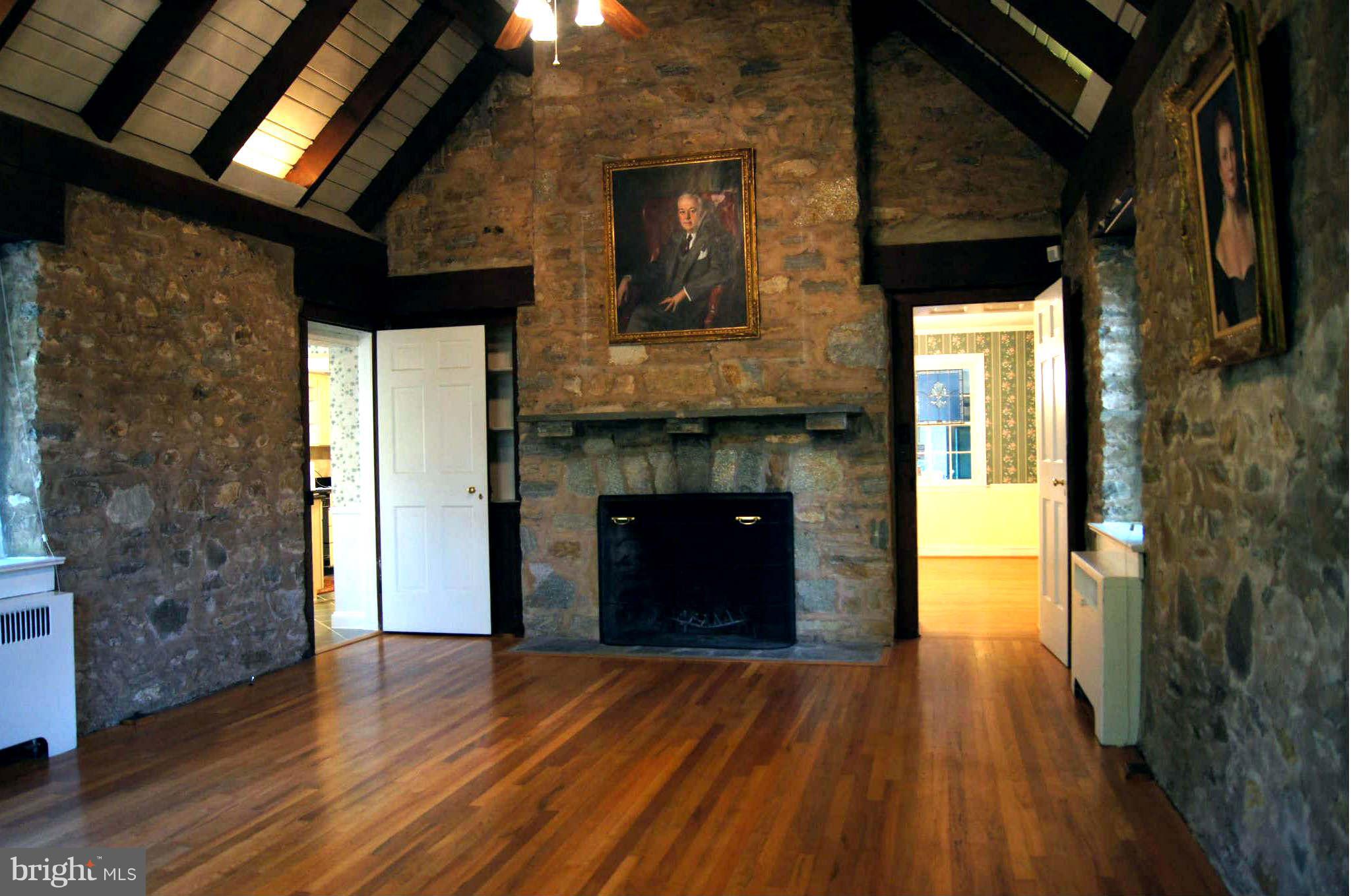 4001 Roundtop Road Baltimore, MD 21218 - Photo 4 of 30 The gem. Vaulted ceilings, stone wall, fp!