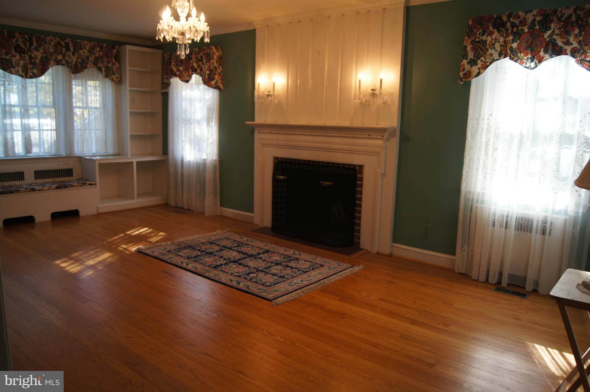 4001 Roundtop Road Baltimore, MD 21218 - Photo 8 of 30 Wood burning fireplace, finest hardwd flooring.