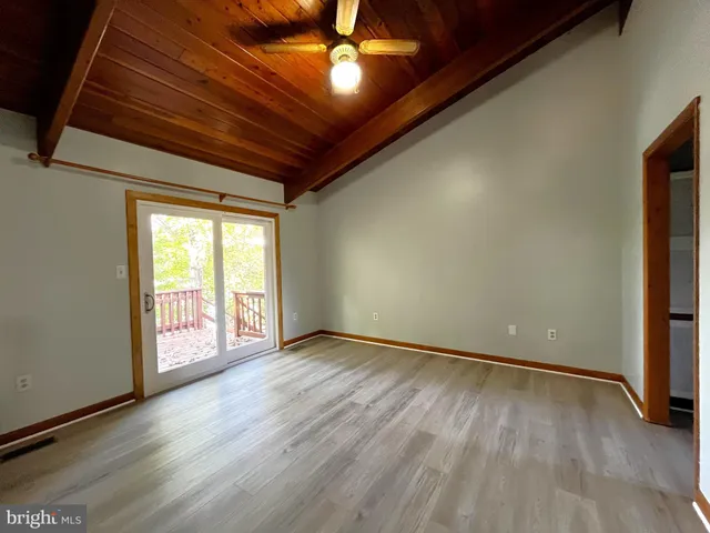 a room with window and a table