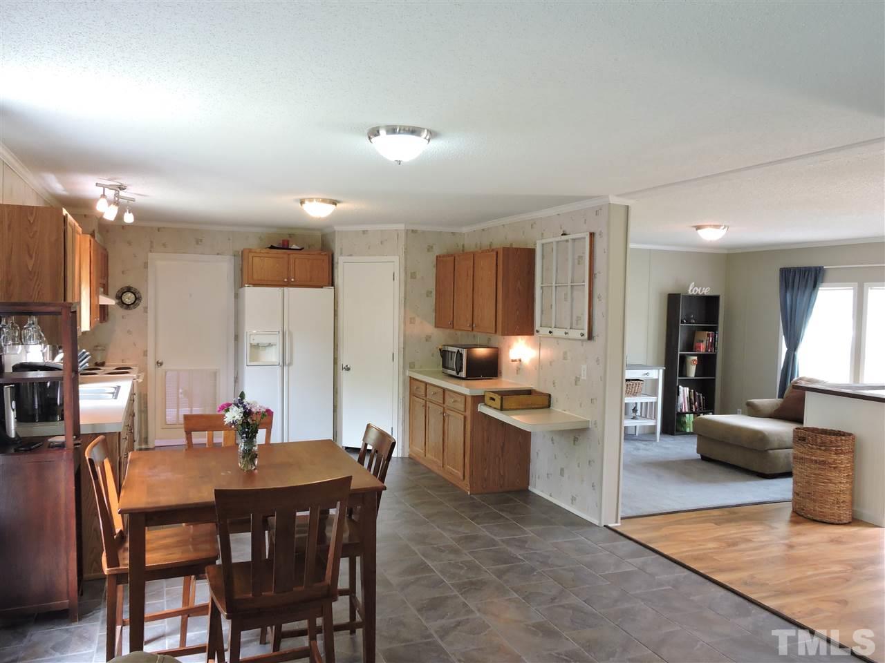 511 Christys Way Roxboro, NC 27574 - Photo 3 of 18 a view of a dining room with furniture