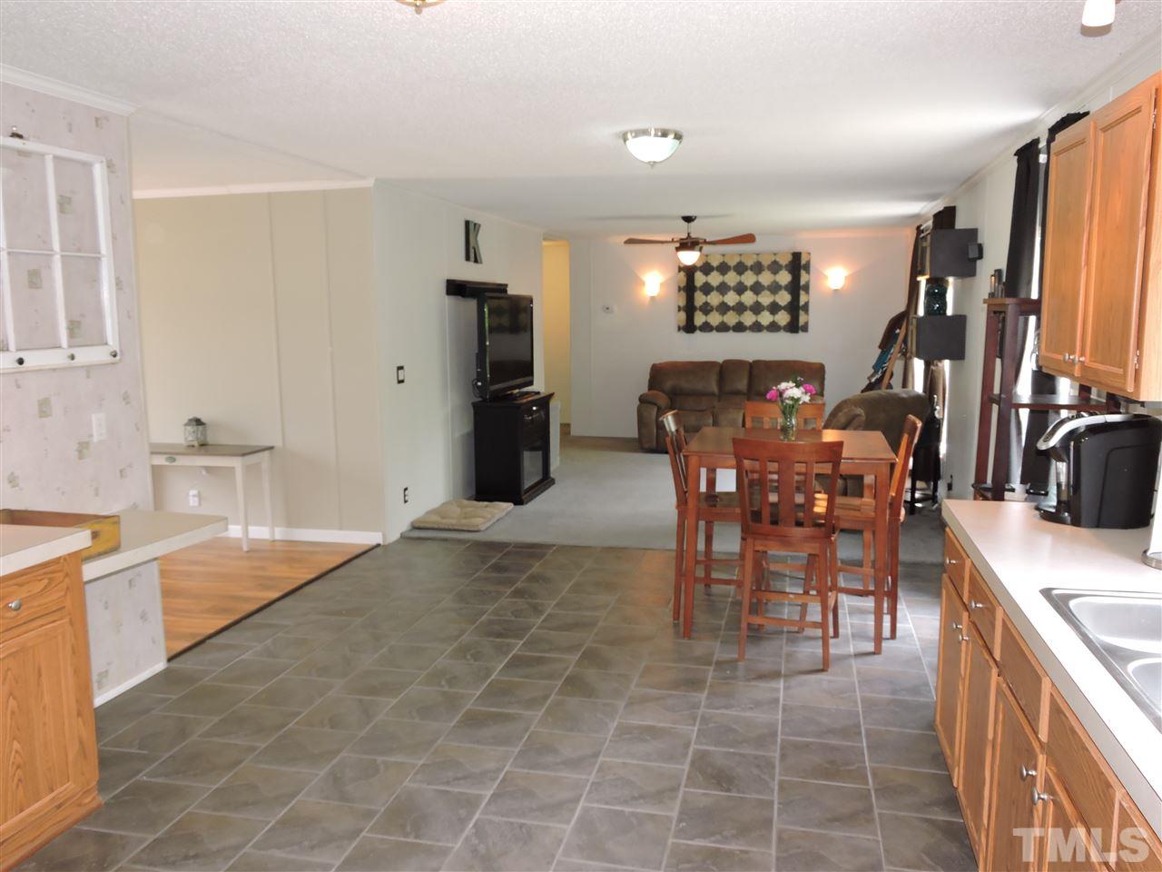 511 Christys Way Roxboro, NC 27574 - Photo 5 of 18 a view of a dining room kitchen and a window