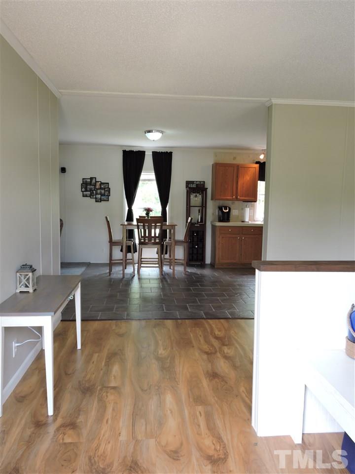 511 Christys Way Roxboro, NC 27574 - Photo 9 of 18 a view of a living room and kitchen