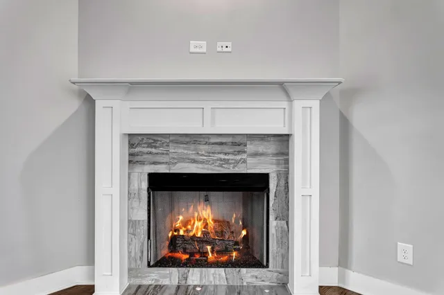 a living room with a fireplace