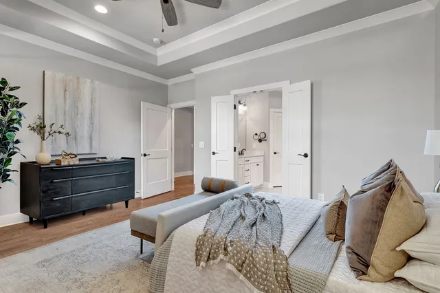 a bed room with a bed and a couch