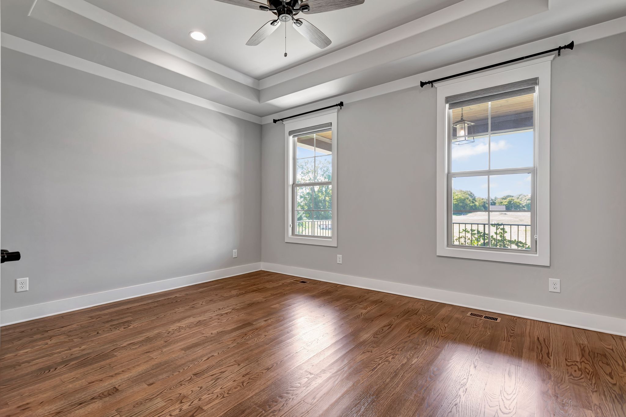4050 Kiskadee Ln Spring Hill Spring Hill, TN 37174 - Photo 21 of 36 a view of an empty room with wooden floor and a window