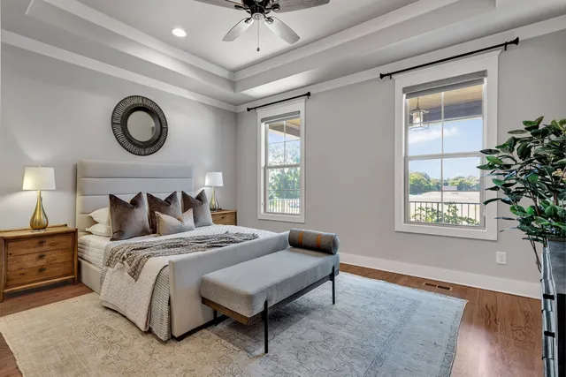 a bedroom with bed and a window