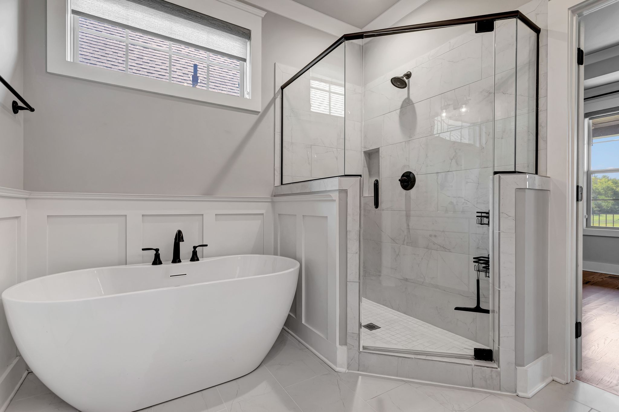 4050 Kiskadee Ln Spring Hill Spring Hill, TN 37174 - Photo 24 of 36 a bathroom with a bathtub and a shower