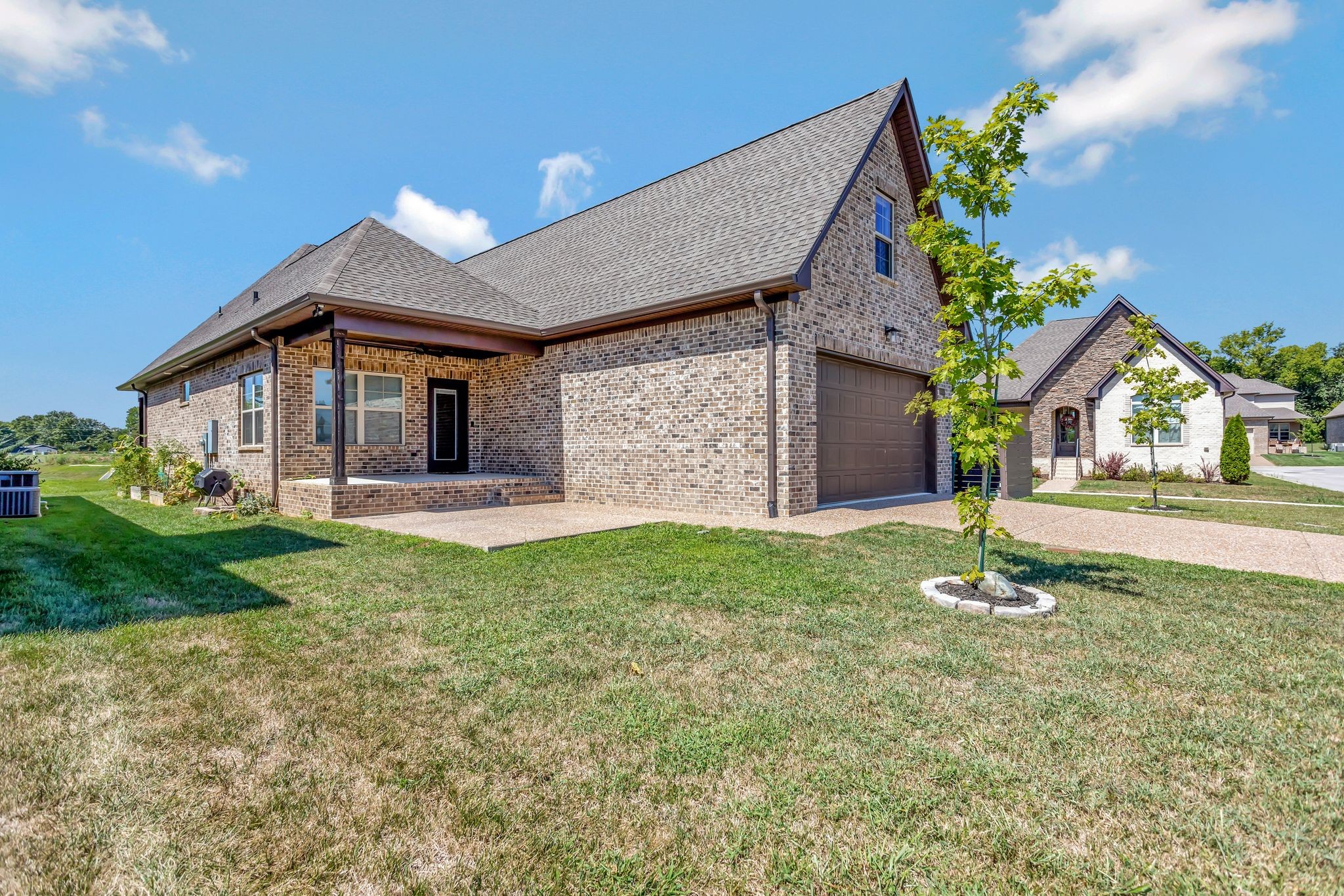 4050 Kiskadee Ln Spring Hill Spring Hill, TN 37174 - Photo 34 of 36 a backyard of a house with lots of green space