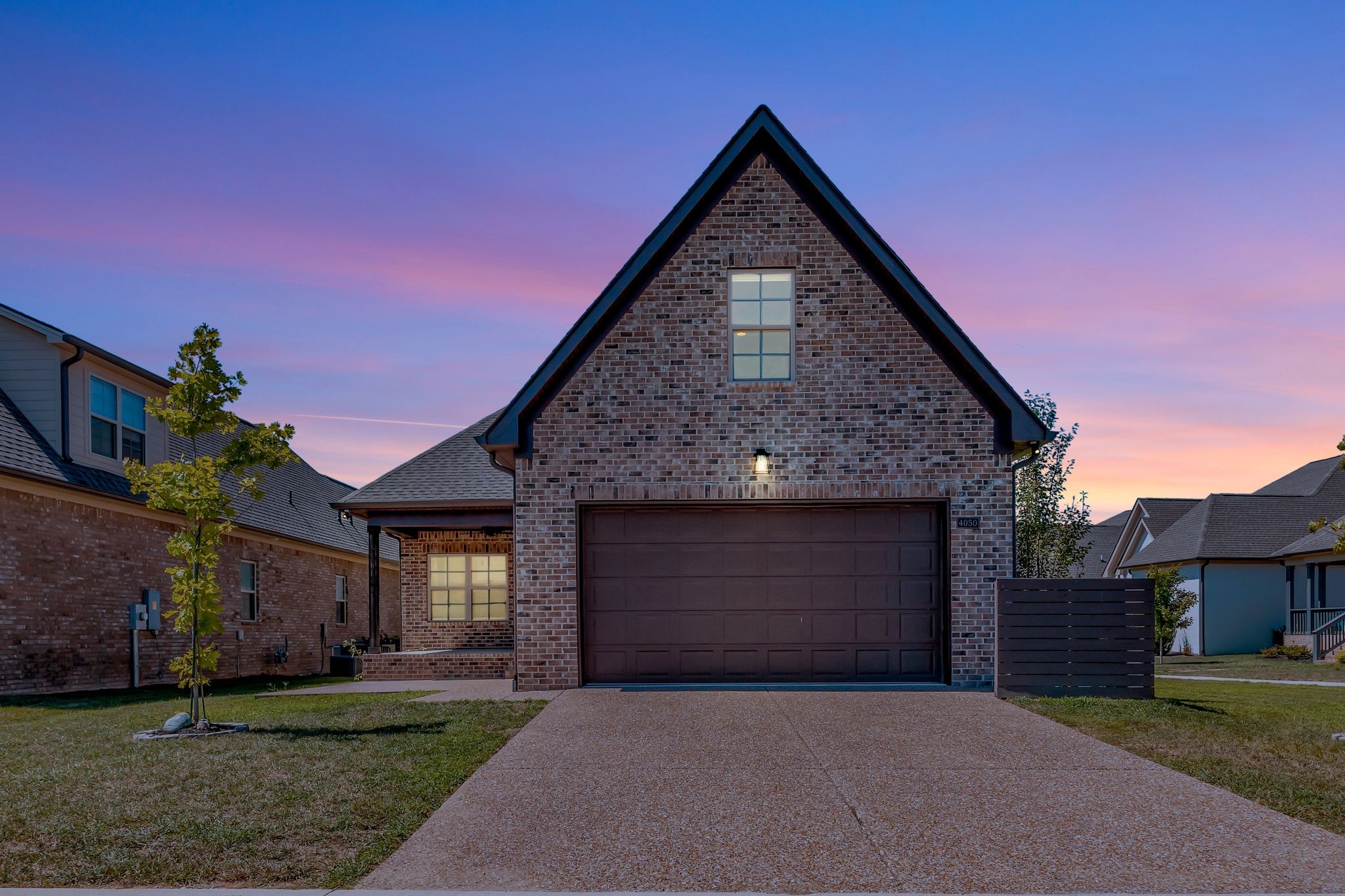 4050 Kiskadee Ln Spring Hill Spring Hill, TN 37174 - Photo 36 of 36 a front view of a house with a yard