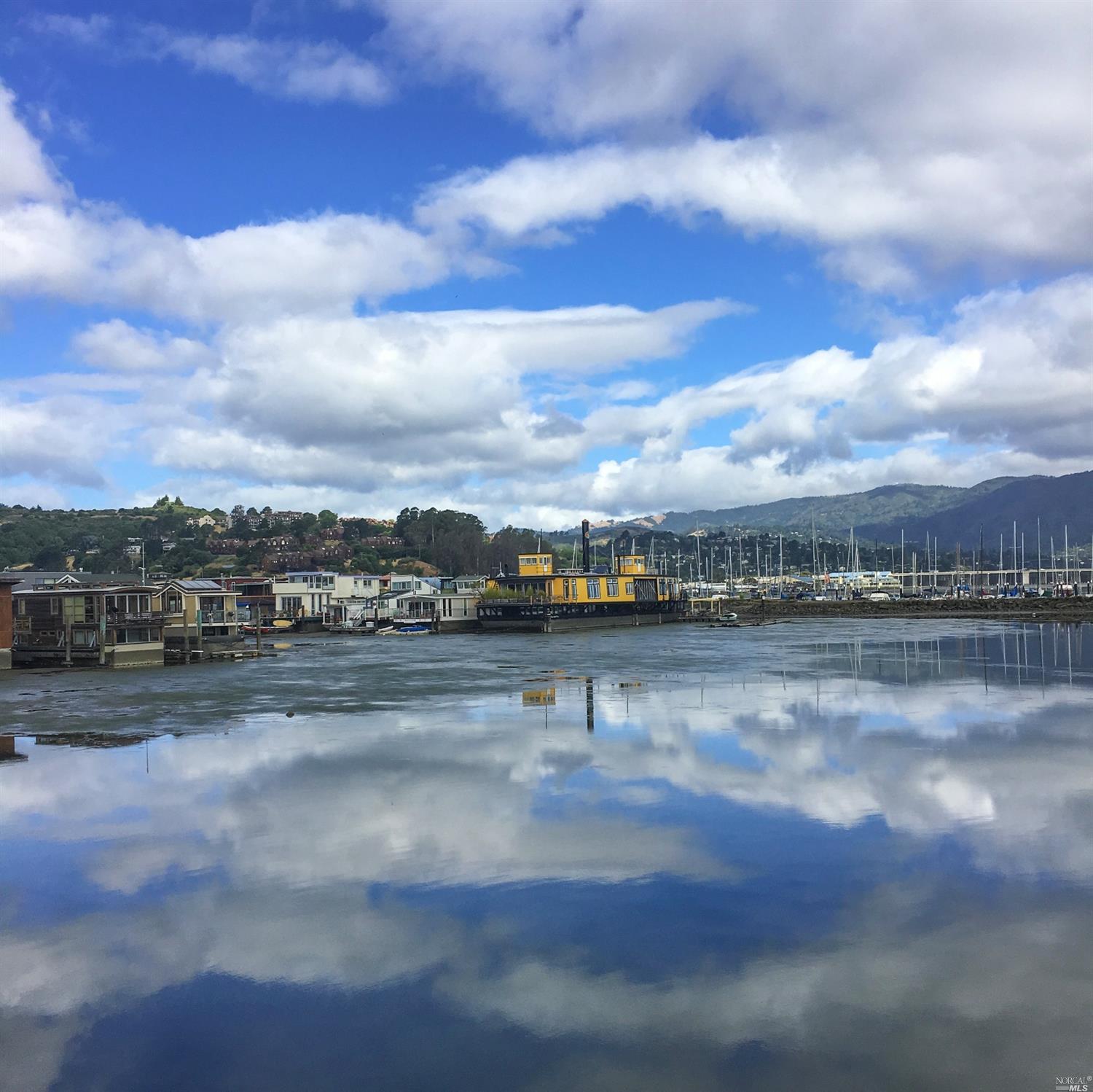 a view of swimming pool with outdoor seating