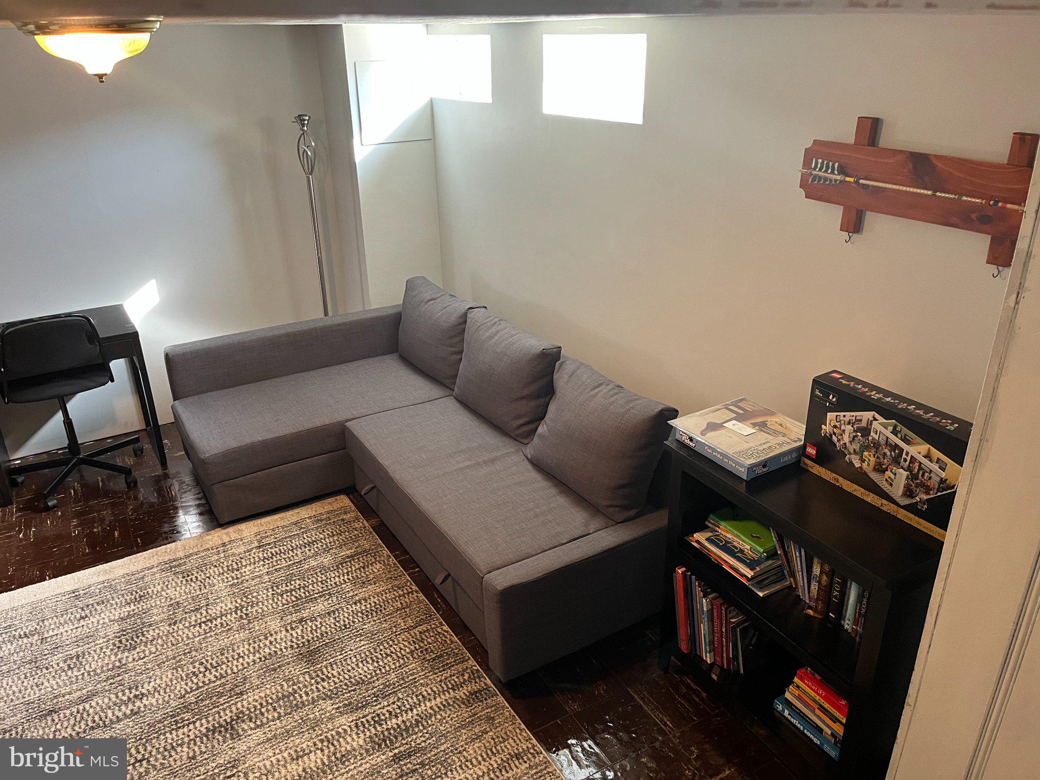 1658 Thetford Road Towson, MD 21286 - Photo 11 of 12 a living room with furniture and a rug