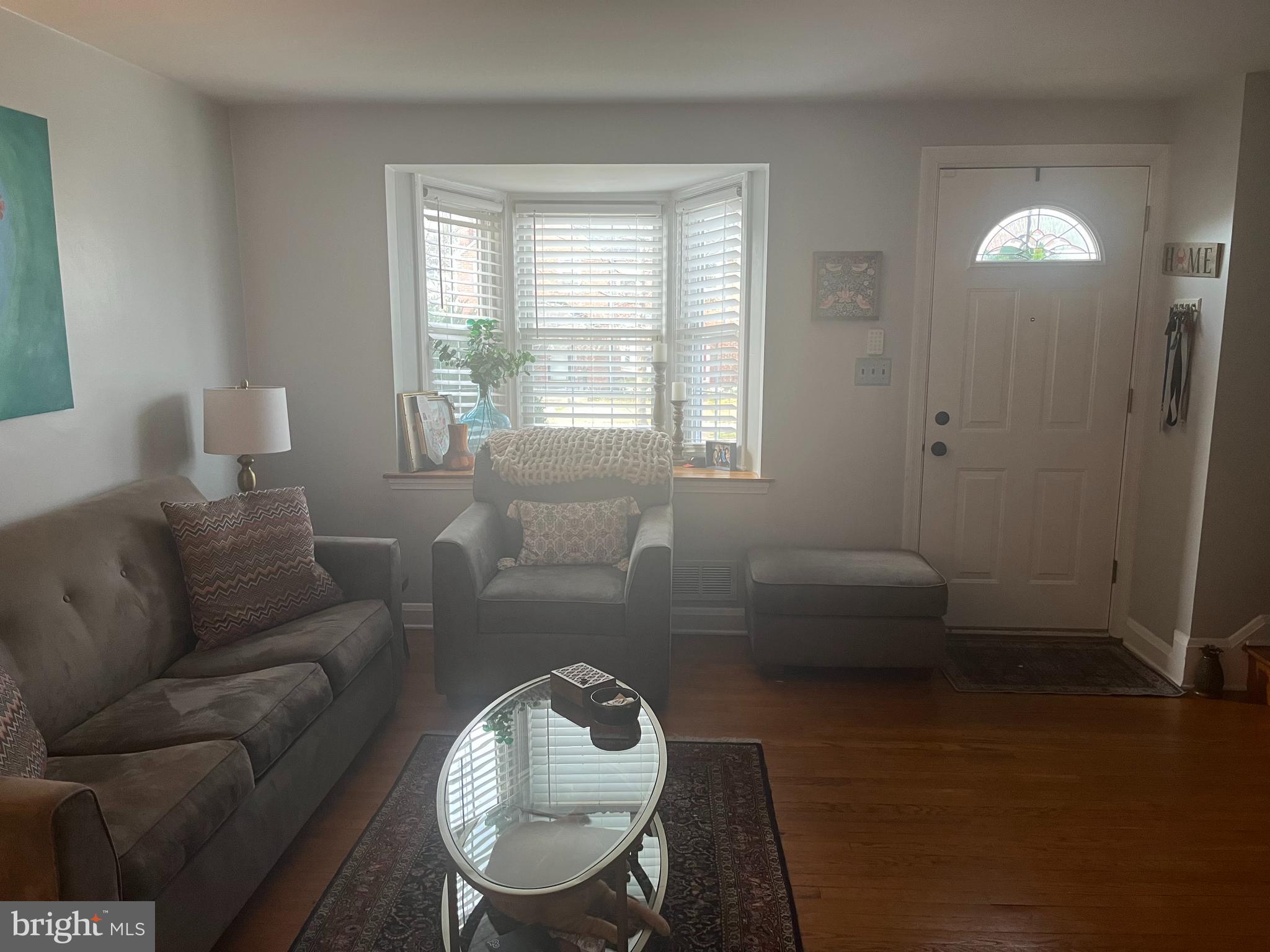 1658 Thetford Road Towson, MD 21286 - Photo 2 of 7 a living room with furniture and a window