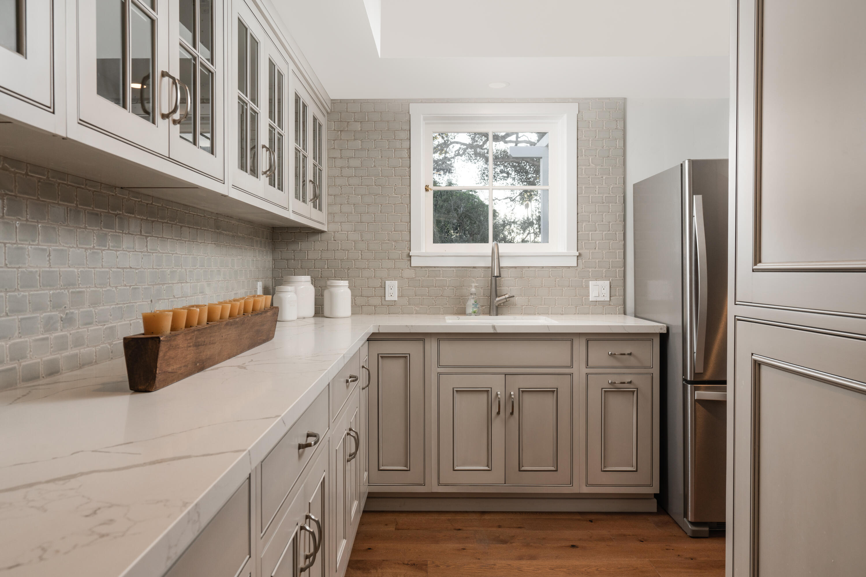 200 Olive Mill Road Montecito, CA 93108 - Photo 13 of 33 a kitchen with stainless steel appliances granite countertop a sink and a refrigerator