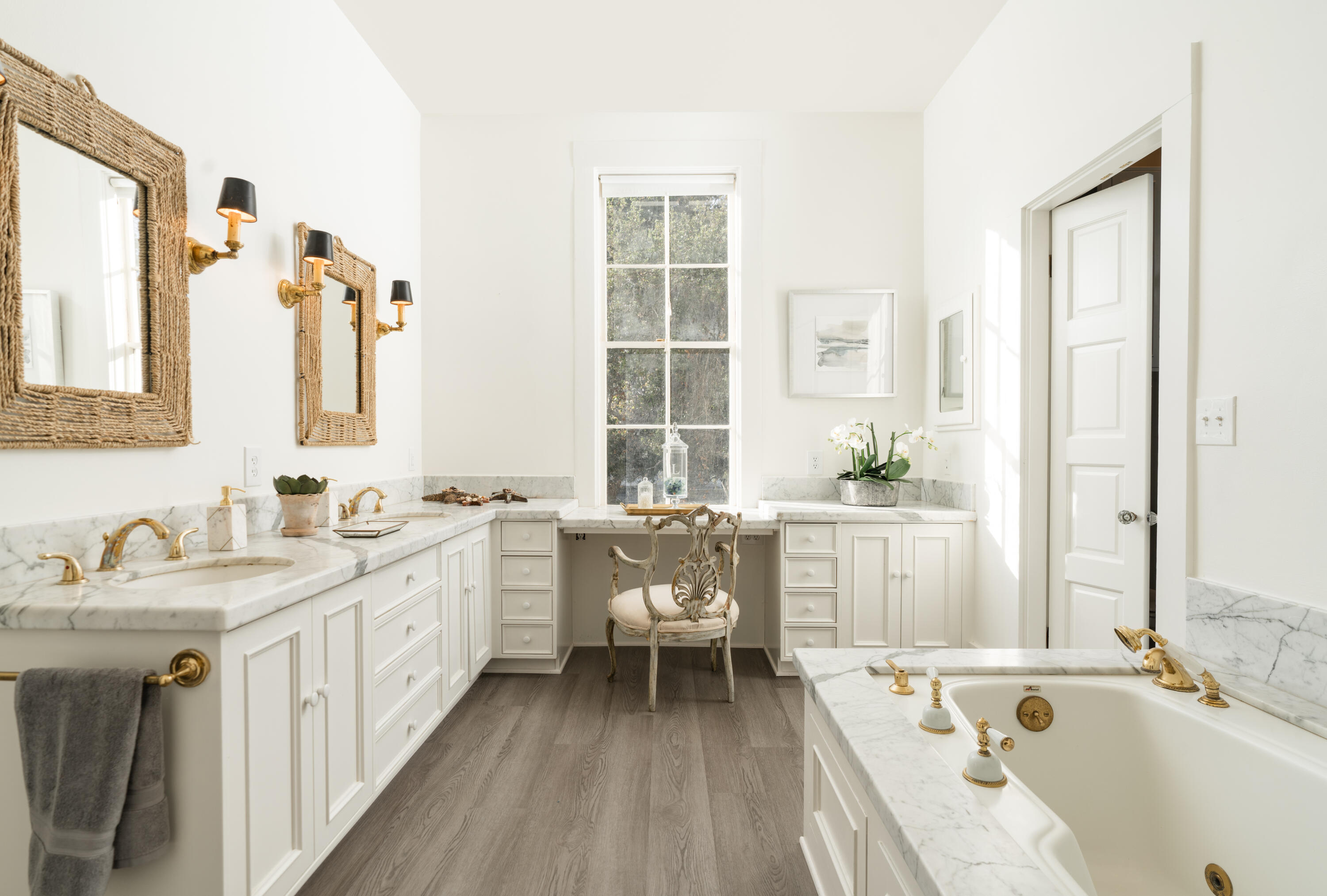 200 Olive Mill Road Montecito, CA 93108 - Photo 17 of 33 a bathroom with a granite countertop tub a sink and a window