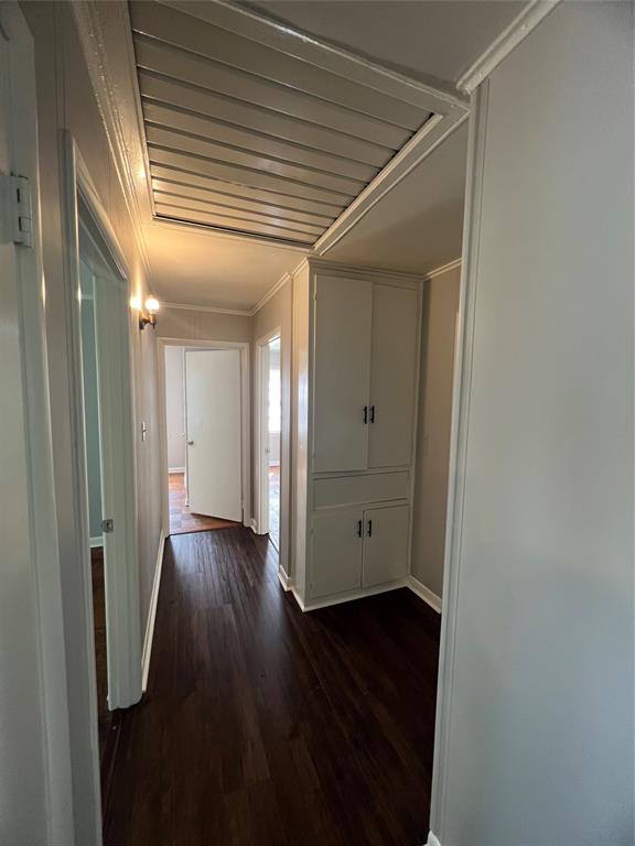 914 Huntington Lane Shreveport, LA 71106 - Photo 6 of 10 a view of an empty room with wooden floor and a window