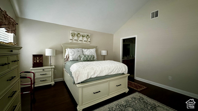 929 West 1920 South, Unit A Syracuse, UT 84075 - Photo 15 of 26 Master bedroom with vaulted ceiling and dark wood-type flooring