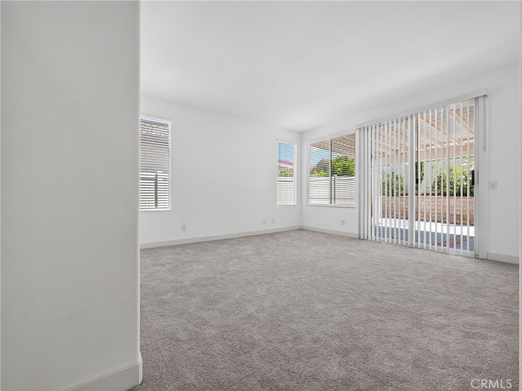 1436 Riviera Avenue Banning, CA 92220 - Photo 29 of 43 a view of a livingroom with wooden floor and a window