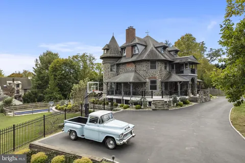 a view of a street with cars on road