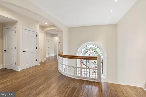 a brick building with a bench in front of it