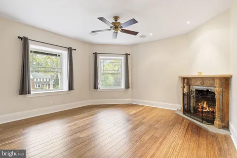 a view of a swimming pool with a yard