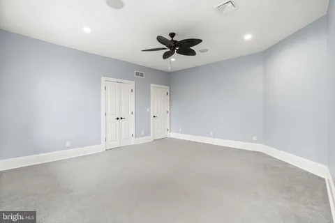 a patio with table and chairs