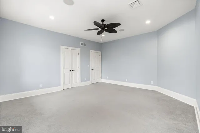 a patio with table and chairs