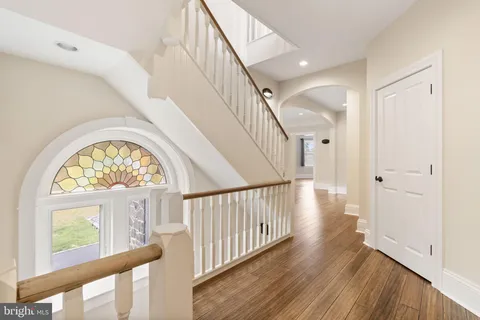 an aerial view of a residential houses with outdoor space