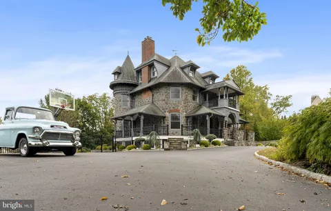 a car parked in front of a house