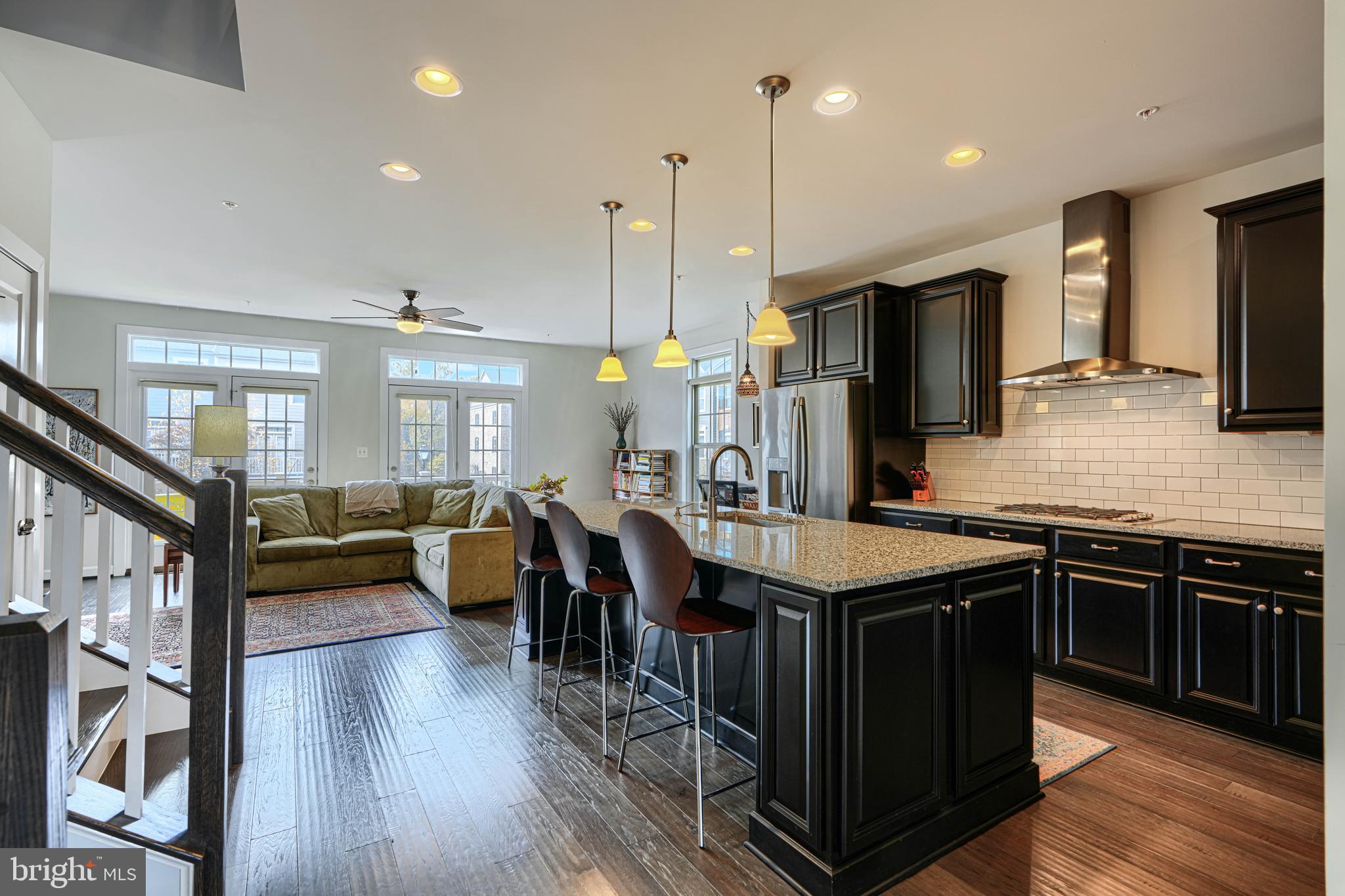 30 Wedge Way, Unit 12 Baltimore, MD 21208 - Photo 11 of 42 a kitchen with lots of counter space a sink appliances and a living room view