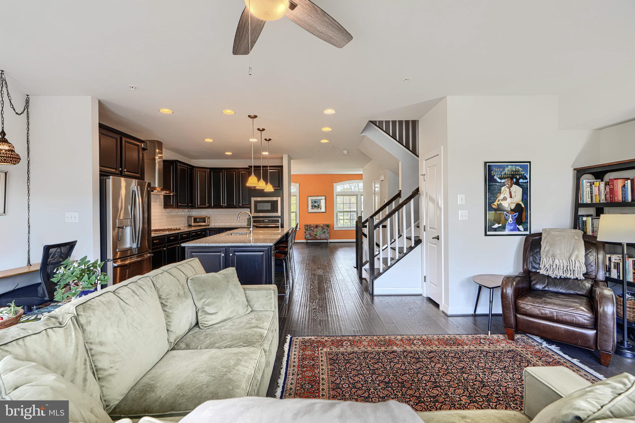 30 Wedge Way, Unit 12 Baltimore, MD 21208 - Photo 16 of 42 a living room with furniture and wooden floor