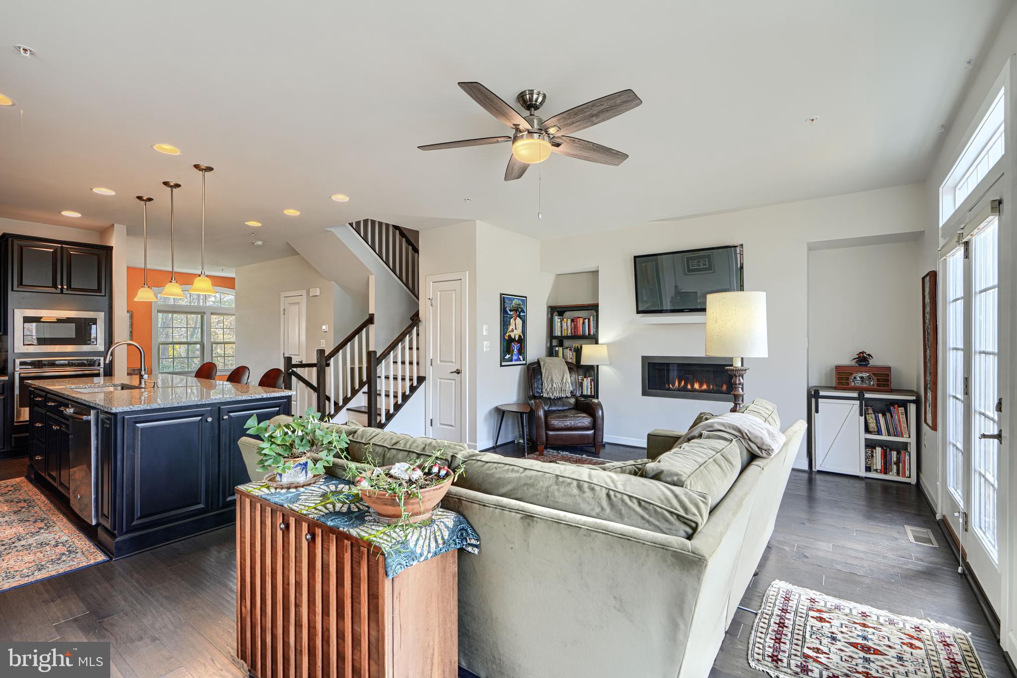 30 Wedge Way, Unit 12 Baltimore, MD 21208 - Photo 17 of 42 a living room with furniture and kitchen