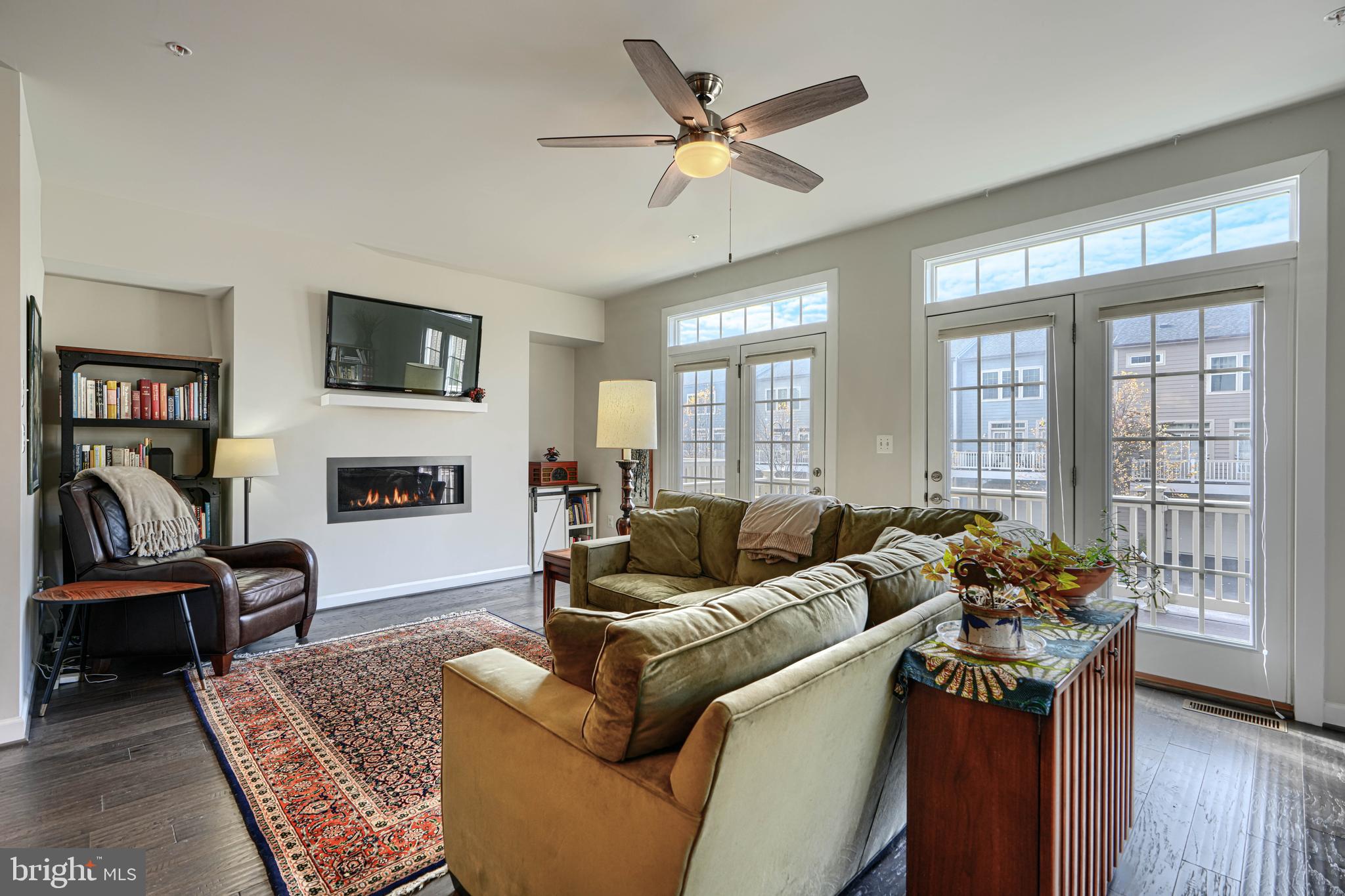 30 Wedge Way, Unit 12 Baltimore, MD 21208 - Photo 18 of 42 a living room with furniture and a flat screen tv
