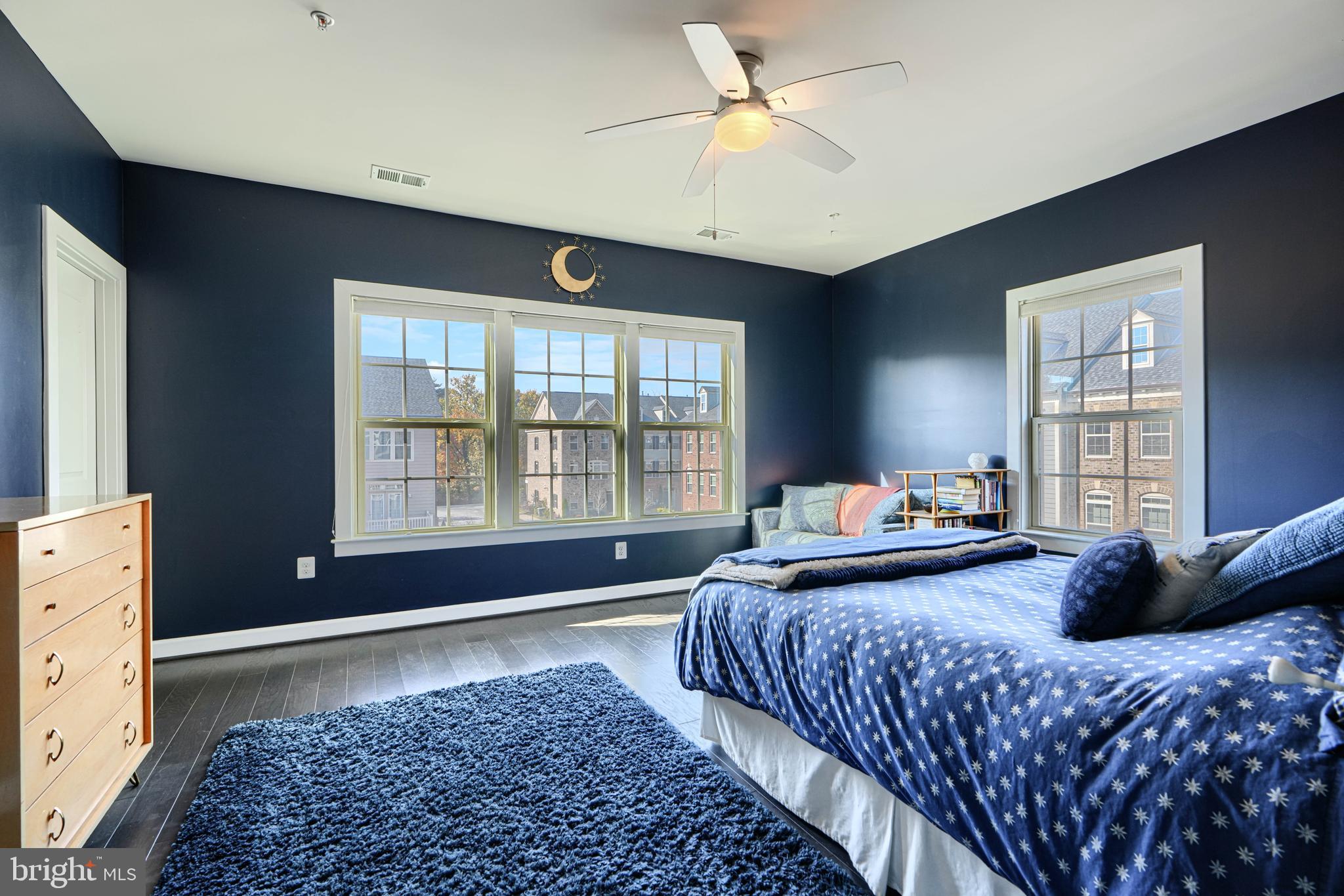 30 Wedge Way, Unit 12 Baltimore, MD 21208 - Photo 24 of 42 a bedroom with a large bed and a window