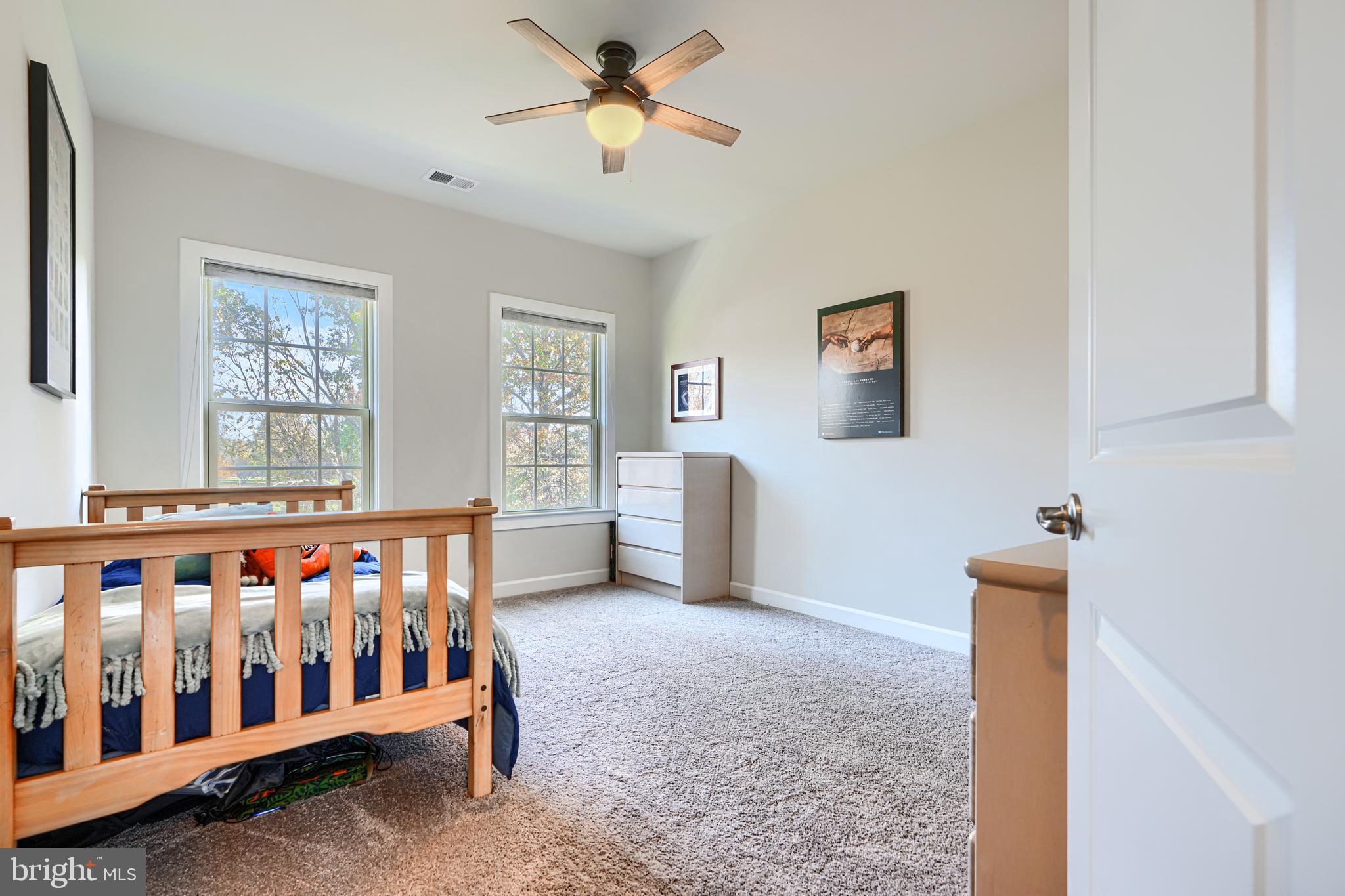 30 Wedge Way, Unit 12 Baltimore, MD 21208 - Photo 33 of 42 a bedroom with furniture and window