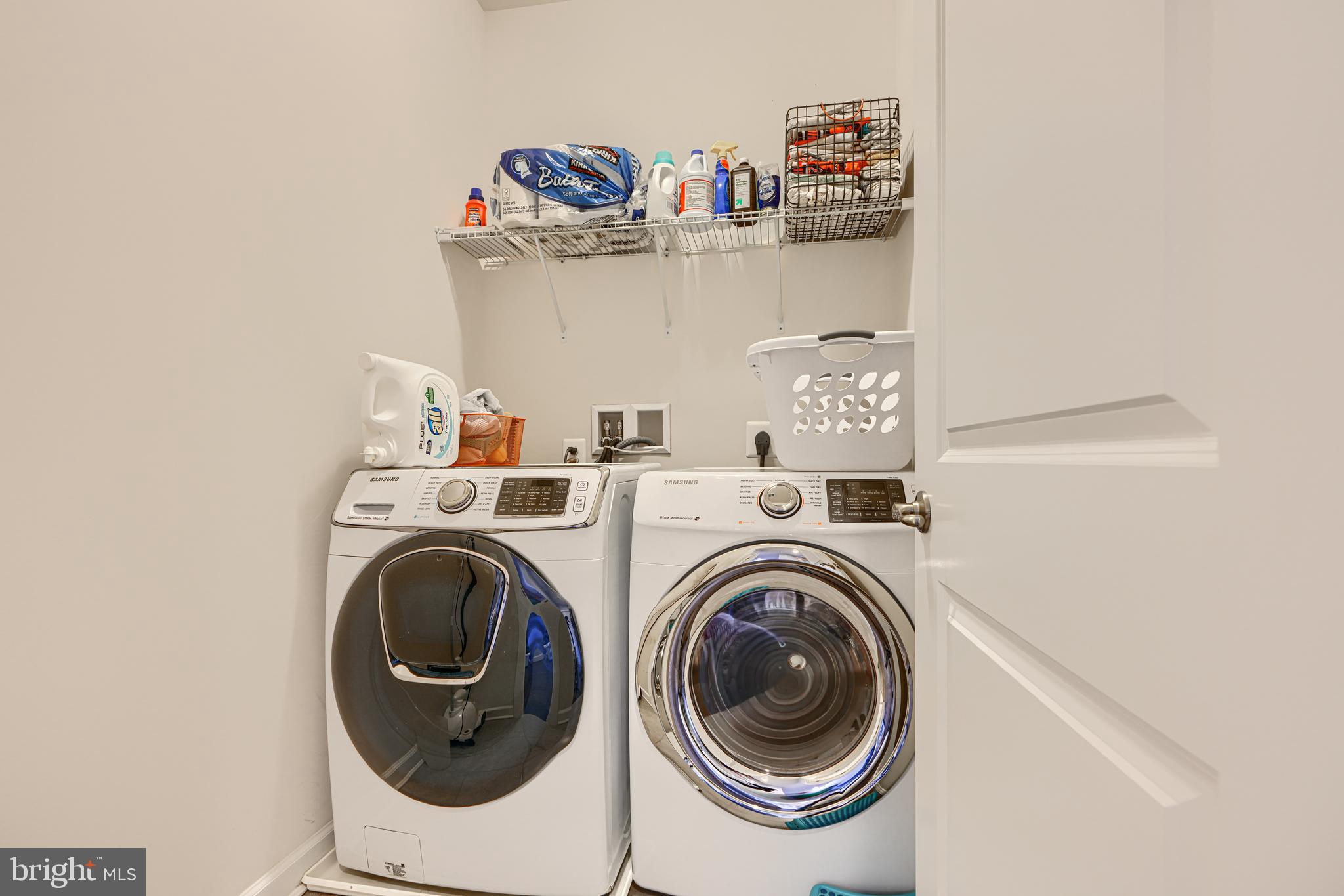 30 Wedge Way, Unit 12 Baltimore, MD 21208 - Photo 38 of 42 a utility room with dryer and washer