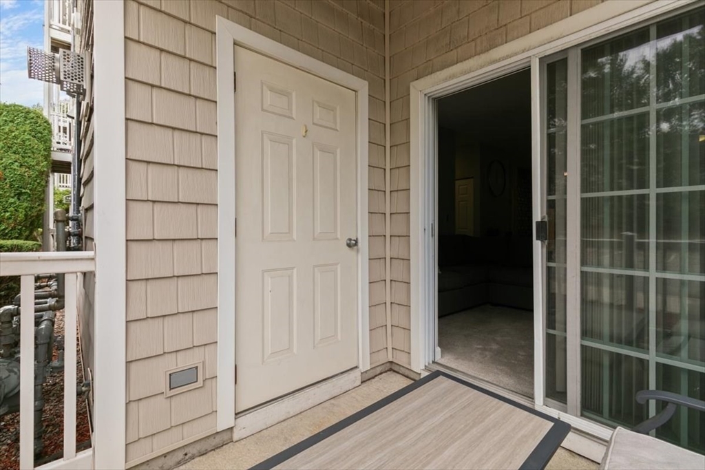 23 Hampshire Road, Unit 108 Methuen, MA 01844 - Photo 25 of 39 a view of a wooden door